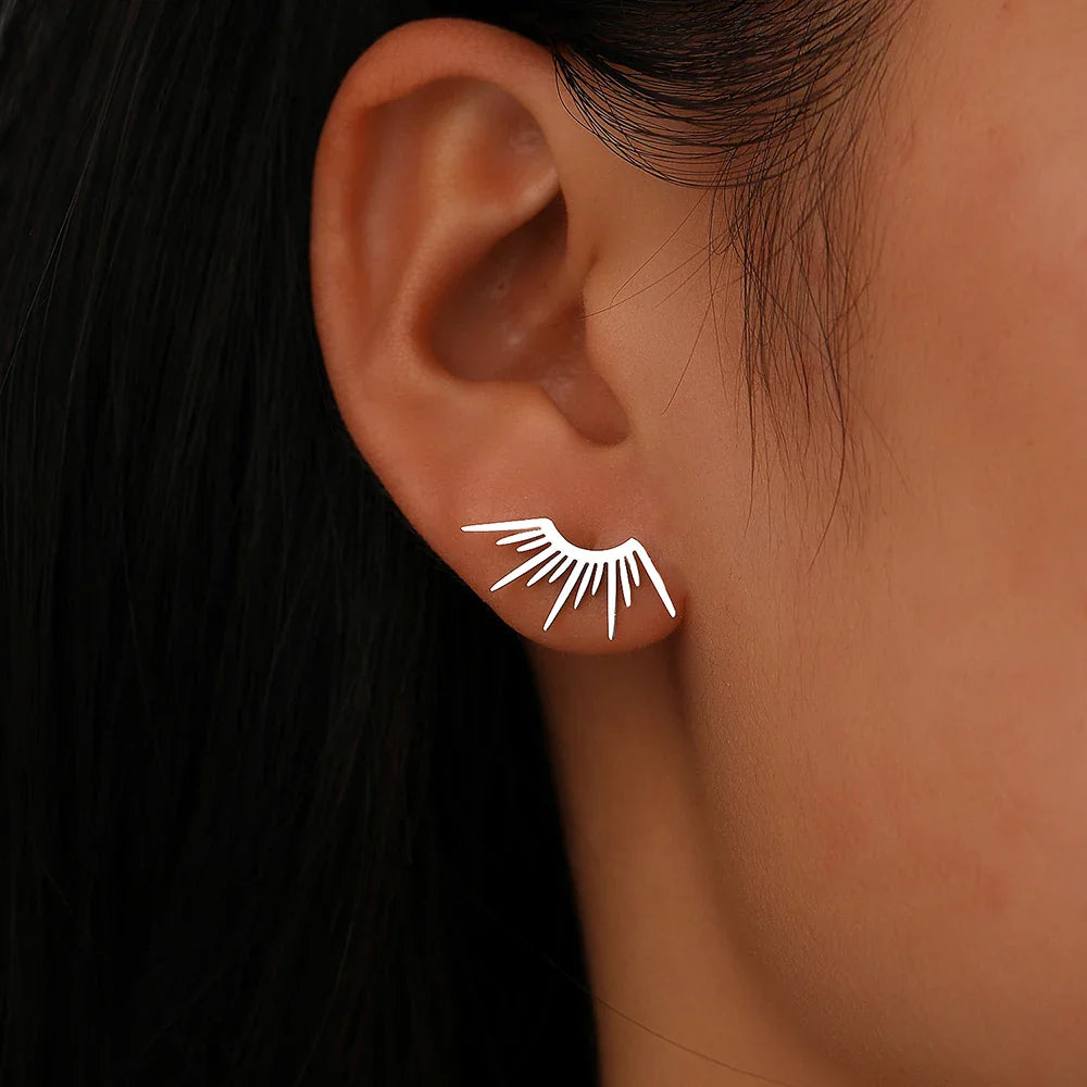 Boucles d'oreilles gothiques avec motif soleil