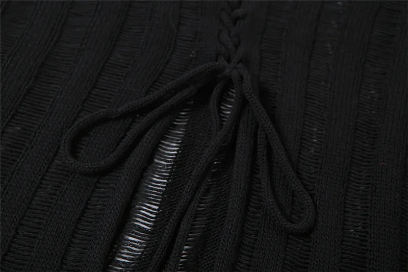 Blouse noire avec ficelle