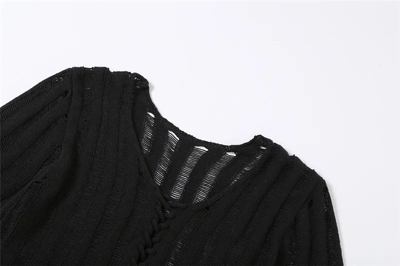 Blouse noire avec ficelle