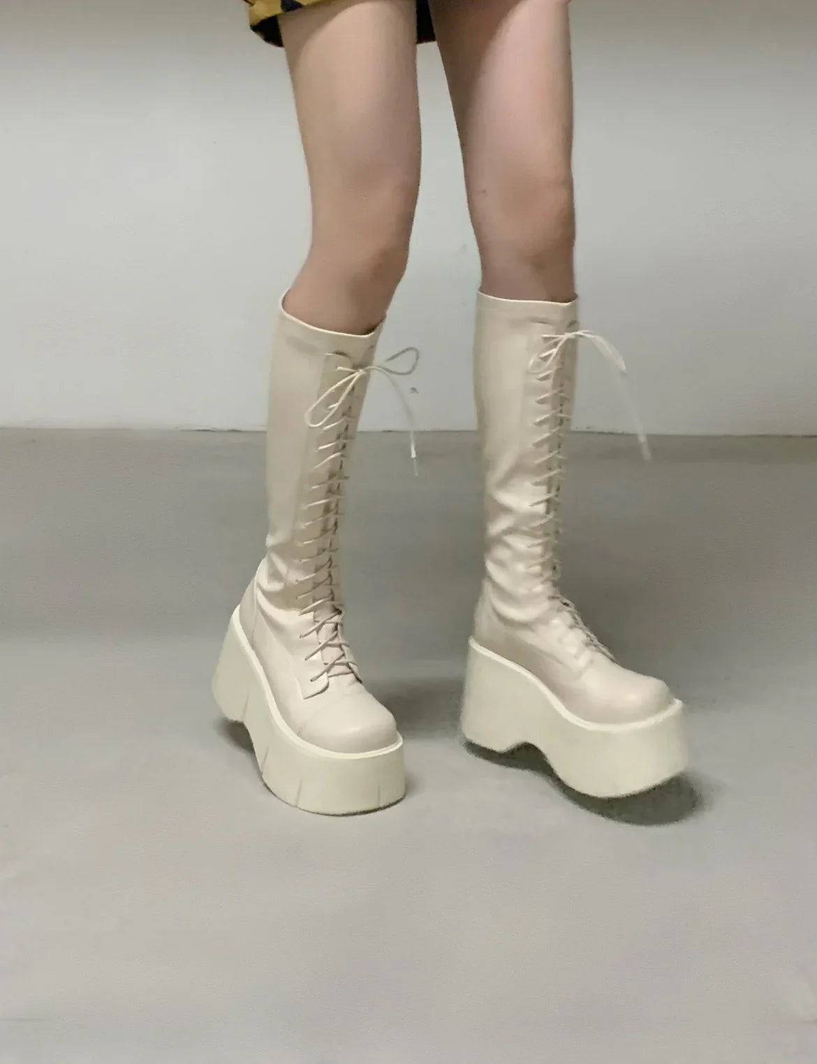 Bottes moto à lacets blanches